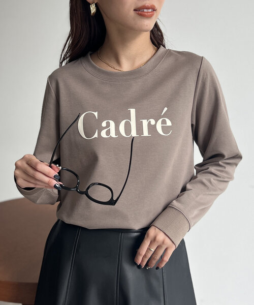 Chez toi（シェトワ）の「袖口リブフロッキーロゴロンT（Tシャツ/カットソー・レディース・ブラック/ベージュ/オフホワイト・FREE）」の2枚目の写真