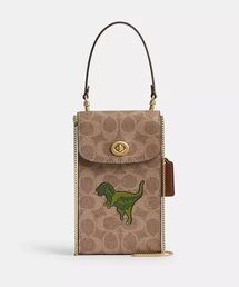 COACH（コーチ）の「ターンロック フォーン クロスボディ・シグネチャー キャンバス・レキシー プリント（スマホグッズ・メンズ）」