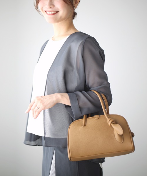Ehre style(エーレスタイル)の「余裕をまとう大人の上品バッグ結びデザインバッグ(ハンドバッグ・レディース・イエロー/ホワイト/ブラウン・FREE)」の6枚目の写真