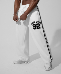 DRIX（ドリックス）の「(夏用) トラックライングラフィックメッシュワイドパンツ_ホワイト（スウェットパンツ）」