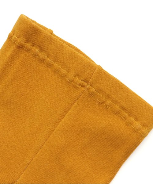 Ampersand(アンパサンド)の「ネコちゃんモチーフスパッツ 10分丈(レギンス/スパッツ・キッズ・マスタード/アイボリー/ネイビー・80/90/110/100/120/140)」の7枚目の写真
