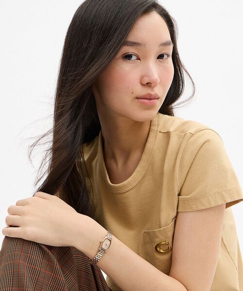 COACH(コーチ)の「グレタ ウォッチ・15.3MM X 25.6MM(アナログ腕時計・レディース・ゴールド系その他・ONE)」の2枚目の写真
