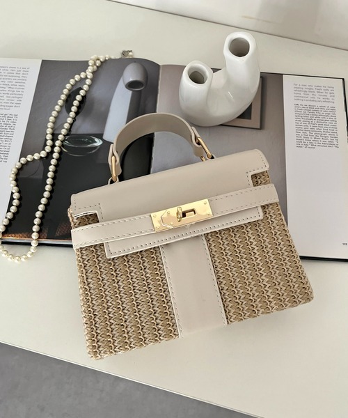 prose verse(プロズヴェール)の「フロントベルトバッグ(かごバッグ・レディース・アイボリー/ブラック・フリ-)」の2枚目の写真