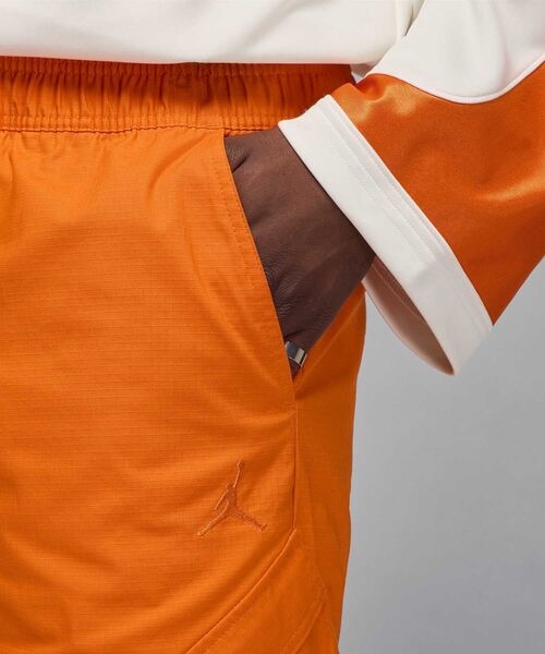 JORDAN BRAND（ジョーダンブランド）の「ジョーダン フライト メンズ ユーティリティ パンツ / Jordan Flight Men's Utility Pants HV0530-805 Starfish（その他パンツ・メンズ・オレンジ・S/M/L/2XL/XL）」の10枚目の写真