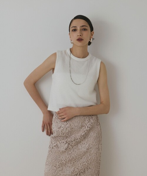 GRACE CONTINENTAL(グレースコンチネンタル)の「ラメフェザ-ニットトップ(その他トップス・レディース・ブラック/ホワイト・36)」の1枚目の写真
