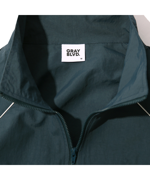 GRAYBLVD（グレイブラバット）の「バスツ パイピング ウィンドブレーカー (ブルーグリーン)（ナイロンジャケット・レディース・その他・MEDIUM/LARGE）」の11枚目の写真