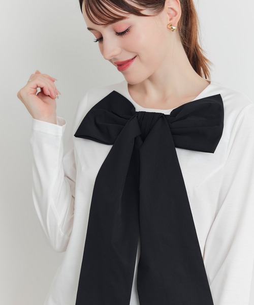 PICCIN(ピッチン)の「フロントリボンプルオーバー(Tシャツ/カットソー・レディース・オフホワイト/ブラック・M)」の1枚目の写真