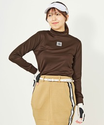 TopIsm(トップイズム)のゴルフウェア モックネックシャツ ハイネック 長袖 シルバーロゴプリント トップス レディース(ゴルフグッズ)