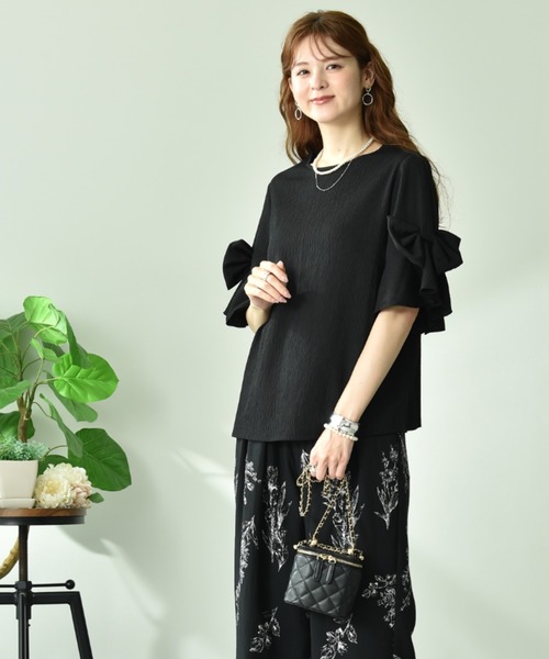 INTERPLANET(インタープラネット)の「カット楊柳袖リボンデザインプルオーバー(Tシャツ/カットソー・レディース・アイボリー/ブラック・FREE)」の15枚目の写真
