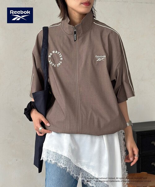 Reebok(リーボック)の「【Reebok】半袖トラックジャケット(ブルゾン・レディース・アイボリー/チャコールグレー/ネイビー・MEDIUM/LARGE)」の14枚目の写真