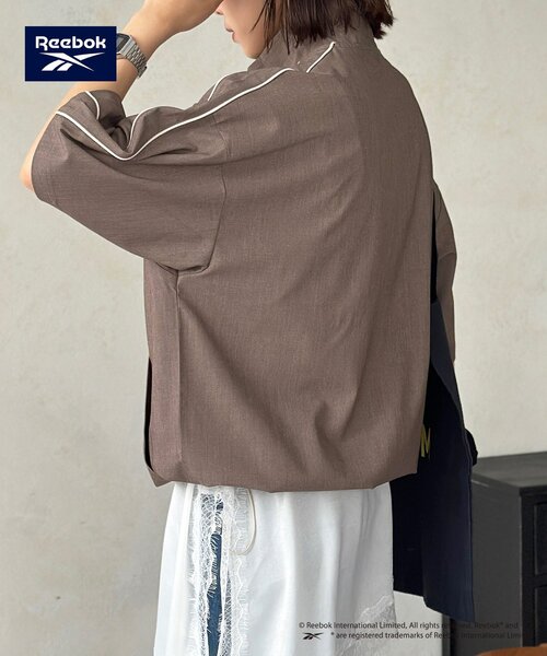 Reebok(リーボック)の「【Reebok】半袖トラックジャケット(ブルゾン・レディース・アイボリー/チャコールグレー/ネイビー・MEDIUM/LARGE)」の15枚目の写真
