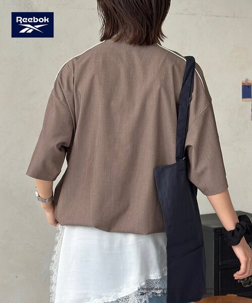 Reebok(リーボック)の「【Reebok】半袖トラックジャケット(ブルゾン・レディース・アイボリー/チャコールグレー/ネイビー・MEDIUM/LARGE)」の16枚目の写真