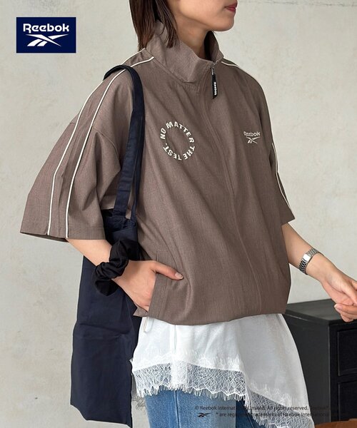 Reebok(リーボック)の「【Reebok】半袖トラックジャケット(ブルゾン・レディース・アイボリー/チャコールグレー/ネイビー・MEDIUM/LARGE)」の17枚目の写真