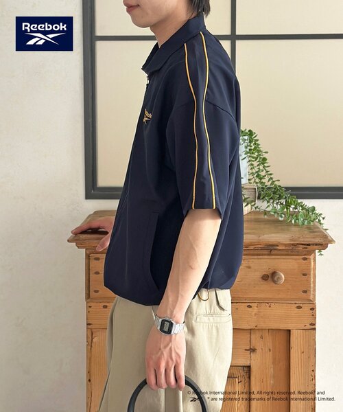 Reebok(リーボック)の「【Reebok】半袖トラックジャケット(ブルゾン・レディース・アイボリー/チャコールグレー/ネイビー・MEDIUM/LARGE)」の21枚目の写真