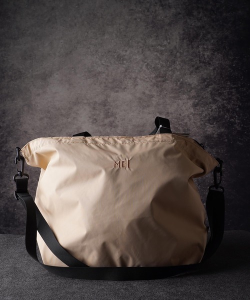 MEI(メイ)の「MEI Lady's Tlavel Tote(ST)(トートバッグ・レディース・ブラック/ベージュ/グリーン/ネイビー・FREE)」の1枚目の写真