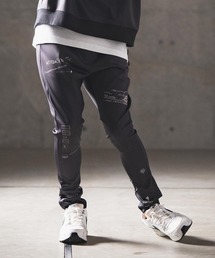 GLIMCLAP（グリムクラップ）の「mp12534- Tight fit track pants -graffiti・hand writing original pattern- ジャージパンツ（その他パンツ・メンズ）」