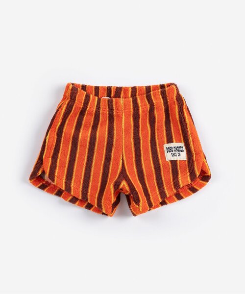 BOBO CHOSES(ボボショーズ)の「Striped Brick terry 半パンツ【ベビー】(その他ベビーウェア・キッズ・オレンジ・95/80)」の1枚目の写真