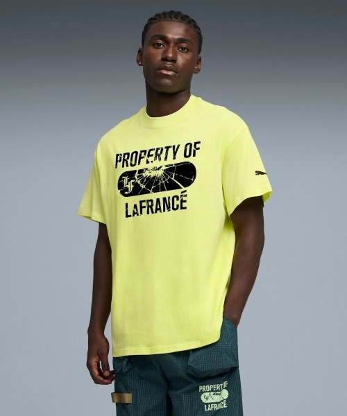 PUMA(プーマ)の「PUMA LAFRANCE SUPPLY TEE II(プーマ ラフランス サプライ ティー ツー)(Tシャツ/カットソー・メンズ・フレッシュイエロー/ブラック系・SMALL/MEDIUM/LARGE/X-LARGE/XX-LARGE)」の1枚目の写真