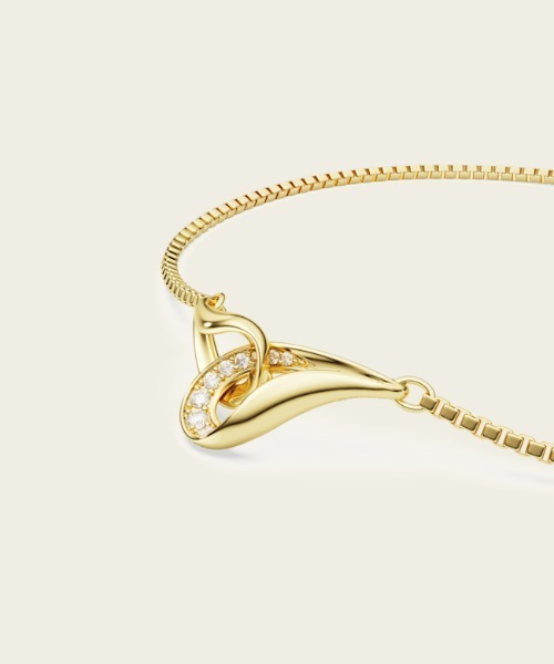 SWAROVSKI（スワロフスキー）の「【公式】【スワロフスキー】Classica ブレスレット, ラウンドカット, インターロッキング, ホワイト, スターリングシルバー, 18Kゴールドコーティング（ブレスレット・レディース・ゴールド系・ONE SIZE）」の3枚目の写真