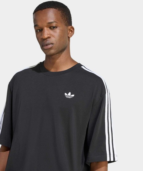 adidas(アディダス)の「アディカラー スリーストライプス オーバーサイズTシャツ / アディダスオリジナルス adidas Originals(Tシャツ/カットソー・メンズ・ブラック・XX-SMALL/X-SMALL/XX-LARGE/MEDIUM/X-LARGE/SMALL/LARGE/3XL)」の6枚目の写真