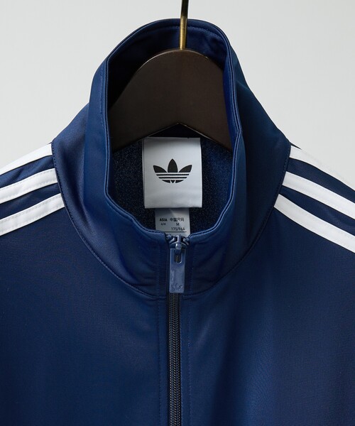 adidas(アディダス)の「【adidas originals/アディダスオリジナルス】ファイヤーバード トラックトップ / FIREBIRD TRACK TOP/LOOS / ユニセックス(ジャージ・メンズ・ダークネイビー/ブラウン・M/L)」の4枚目の写真