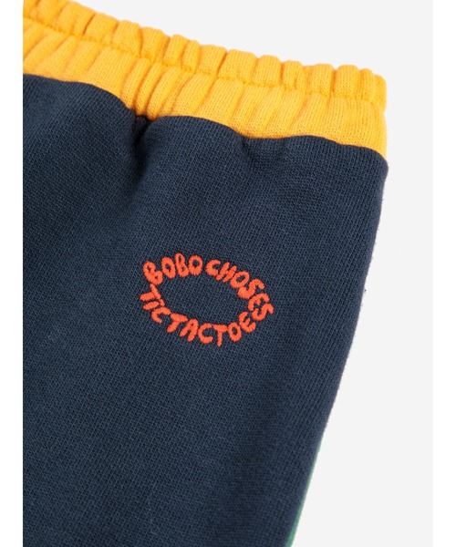 BOBO CHOSES(ボボショーズ)の「Bobo Choses color block jogging pants(スウェットパンツ・キッズ・レッド・12MONTH/24MONTH/18MONTH/3MONTH/6MONTH/9MONTH)」の3枚目の写真