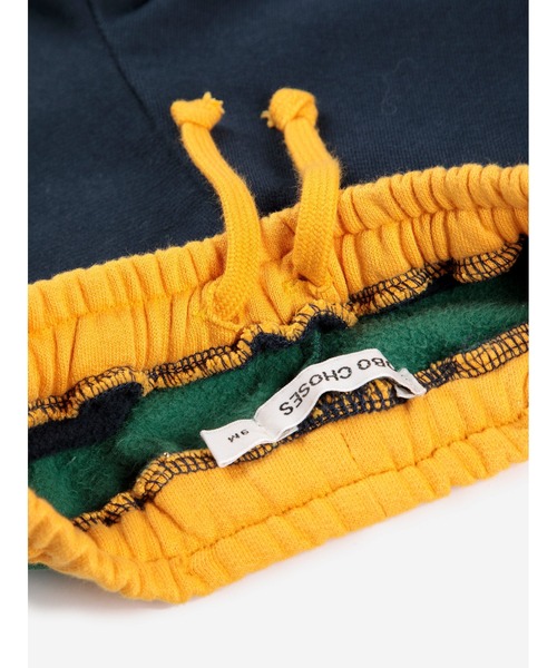 BOBO CHOSES(ボボショーズ)の「Bobo Choses color block jogging pants(スウェットパンツ・キッズ・レッド・12MONTH/24MONTH/18MONTH/3MONTH/6MONTH/9MONTH)」の4枚目の写真