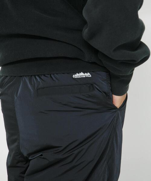 THOUSAND MILE（サウザンドマイル）の「『別注』THOUSAND MILE×URBAN RESEARCH　PADDED WIDE PANTS（その他パンツ・メンズ・ネイビー/ブラック・MEDIUM/LARGE）」の8枚目の写真