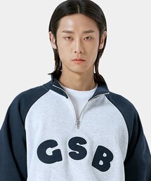 GAINSBORO（ゲインズボロ）の「GSBロゴラグランハーフジップ_ホワイトメランジ/ネイビー（スウェット）」