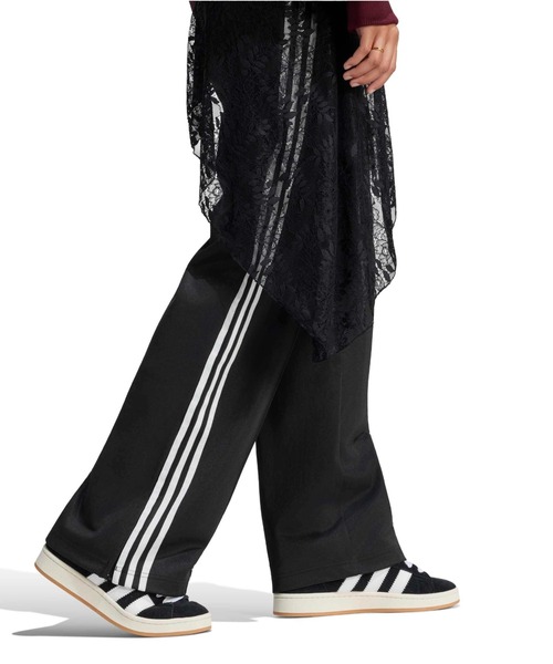 adidas(アディダス)の「adidas 2IN1 FIREBIRD LOOSE TRACK TROUSERS WITH LACE SKIRT / アディダス レーススカート付き 2イン1 ファイヤーバード ルーズ トラックパンツ(その他パンツ・レディース・ブラック・S/M/L)」の7枚目の写真
