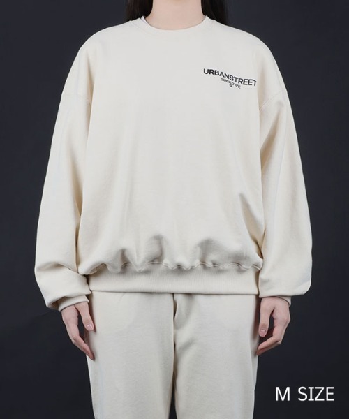 DUCKDIVE(ダックダイブ)の「【DUCKDIVE 】ロゴクルーネックスウェットシャツ / SYB LOGO TOS CREWNECK SWEATSHIRT(スウェット・メンズ・アイボリー/ブラック/ダークカーキ/チャコール・LARGE/MEDIUM)」の1枚目の写真