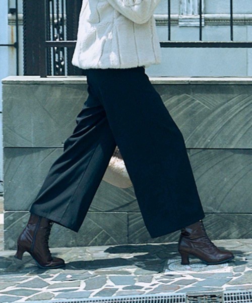 an another angelus（アンアナザーアンジェラス）の「フロントゴールド釦使いストレートパンツ/ananotherangelus（その他パンツ・レディース・インディゴブルー/ブラック・1/2）」の5枚目の写真