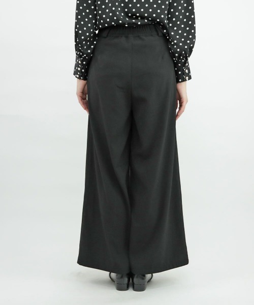 an another angelus（アンアナザーアンジェラス）の「フロントゴールド釦使いストレートパンツ/ananotherangelus（その他パンツ・レディース・インディゴブルー/ブラック・1/2）」の12枚目の写真