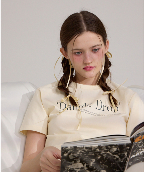 DANGLEDROP(ダングルドロップ)の「DGDPタイポセミクロップ半袖Tシャツクリーム(Tシャツ/カットソー・レディース・その他・FREE)」の4枚目の写真