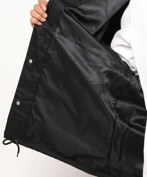 Mark Gonzales(マーク・ゴンザレス)の「【 Mark Gonzales / マークゴンザレス 】 BIG LOGO コーチジャケット(ナイロンジャケット・メンズ・ブラック・M/L)」の4枚目の写真