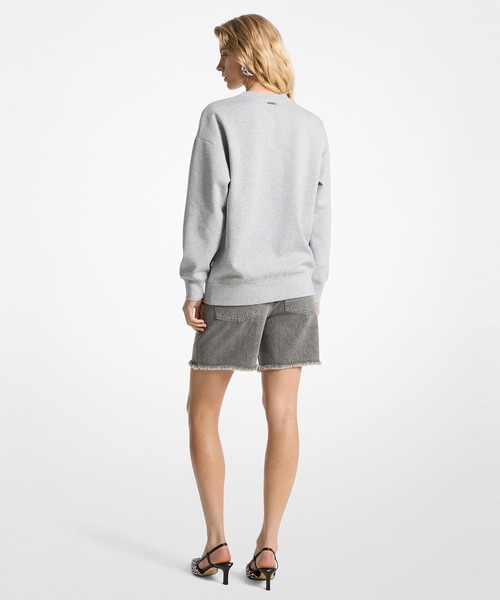 MICHAEL KORS（マイケルコース）の「ロゴ エンボス クルーネック スウェット（スウェット・レディース・ヘザーグレー・XS/S/M/L）」の2枚目の写真