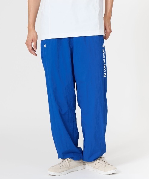 le coq sportif(ルコックスポルティフ)の「【はっ水】ナイロンウィンドブレーカーパンツ(その他パンツ・メンズ・ネイビー/ブルー・M/L)」の2枚目の写真
