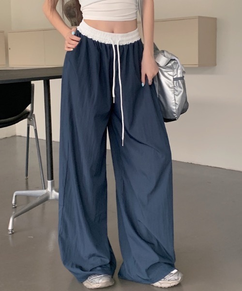 Teem Store(チームストア)の「ウエスト切り替えナイロンイージーパンツ(その他パンツ・レディース・ブラック/ネイビー・S/M)」の1枚目の写真
