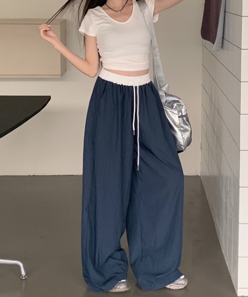 Teem Store(チームストア)の「ウエスト切り替えナイロンイージーパンツ(その他パンツ・レディース・ブラック/ネイビー・S/M)」の17枚目の写真