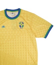 INNOCENT（イノセント）の「【T21】【umbro/アンブロ】2024 BRAZIL ICONIC GRAPHIC JERSEY ブラジル アイコニック グラフィック ジャージ UUM155930U（Tシャツ/カットソー）」