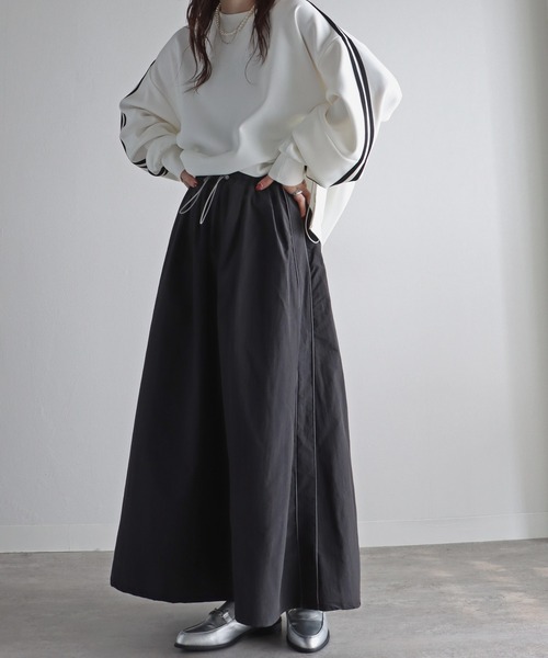 COURO（コウロ）の「パイピングサイドラインナイロンスカート（スカート・レディース・アイボリー/ブラック/オリーブ/ブルー・M/L）」の3枚目の写真