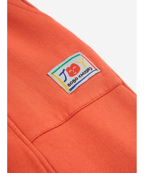 BOBO CHOSES（ボボショーズ）の「Smiling red jogging pants（スウェットパンツ・キッズ・レッド・12-13y/10-11y/2-3YEAR）」の4枚目の写真