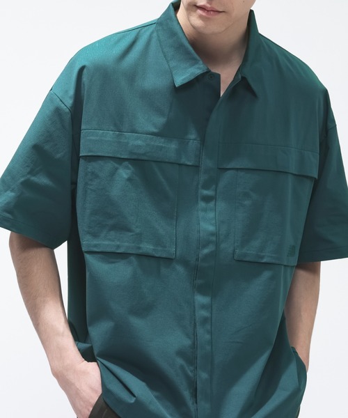 NEW BALANCE(ニューバランス)の「【別注】ニューバランス New Balance ショートスリーブメッシュニットシャツ 限定コラボ(Tシャツ/カットソー・メンズ・ダークグリーン/グレー/ブラック・S/M/L/LL)」の1枚目の写真