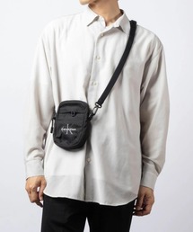 ECHELLE Liberte（エシェルリベルテ）の「Calvin Klein カルバンクライン BOLD LOGO NYLON SLIM REPORTER ショルダーバッグ（ショルダーバッグ）」