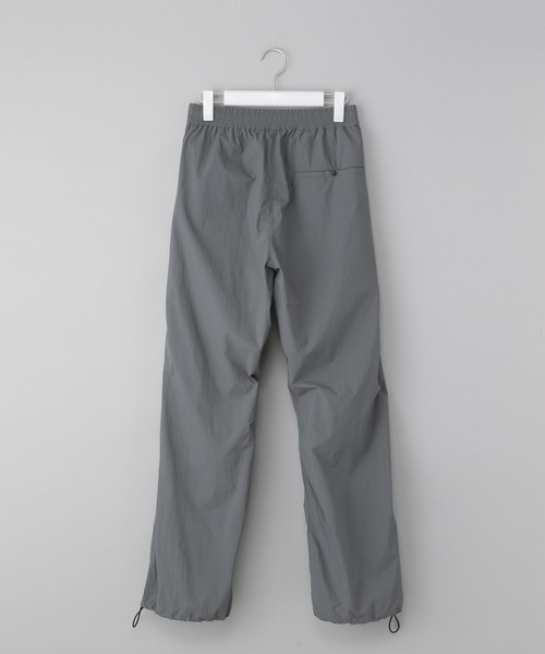 NUMERALS（ヌメラルズ）の「[NUMERALS]ナイロントラックパンツ（その他パンツ・メンズ・ブラック/チャコール・MEDIUM/LARGE）」の8枚目の写真