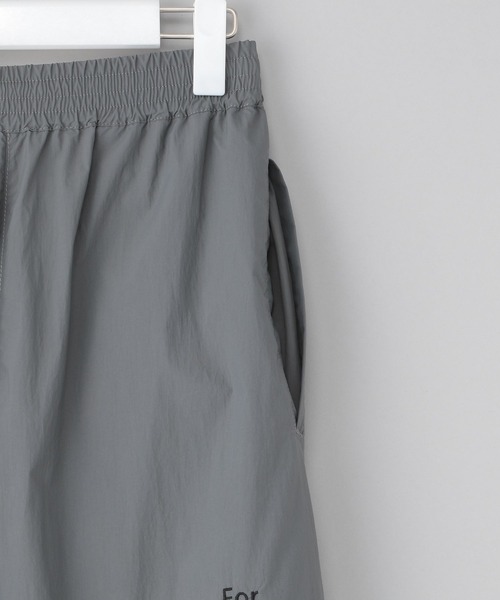 NUMERALS（ヌメラルズ）の「[NUMERALS]ナイロントラックパンツ（その他パンツ・メンズ・ブラック/チャコール・MEDIUM/LARGE）」の3枚目の写真