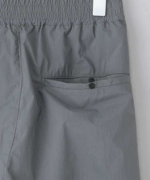 NUMERALS（ヌメラルズ）の「[NUMERALS]ナイロントラックパンツ（その他パンツ・メンズ・ブラック/チャコール・MEDIUM/LARGE）」の9枚目の写真