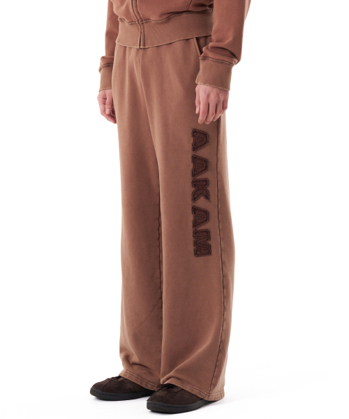 AAKAM(アーカム)の「Washed Logo Sweatpants (Brown)(スウェットパンツ・レディース・その他・1/2)」の1枚目の写真