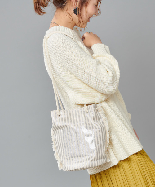 DISCOAT（ディスコート）の「フリンジ巾着バッグ（ショルダーバッグ・レディース・アイボリー/ホワイト系その他/ブラック・FREE）」の11枚目の写真