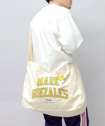 （What it isNt）ART BY MARKGONZALES（ワットイットイズント）の「キャンバス ニュースペーパーバッグ（ショルダーバッグ・メンズ）」